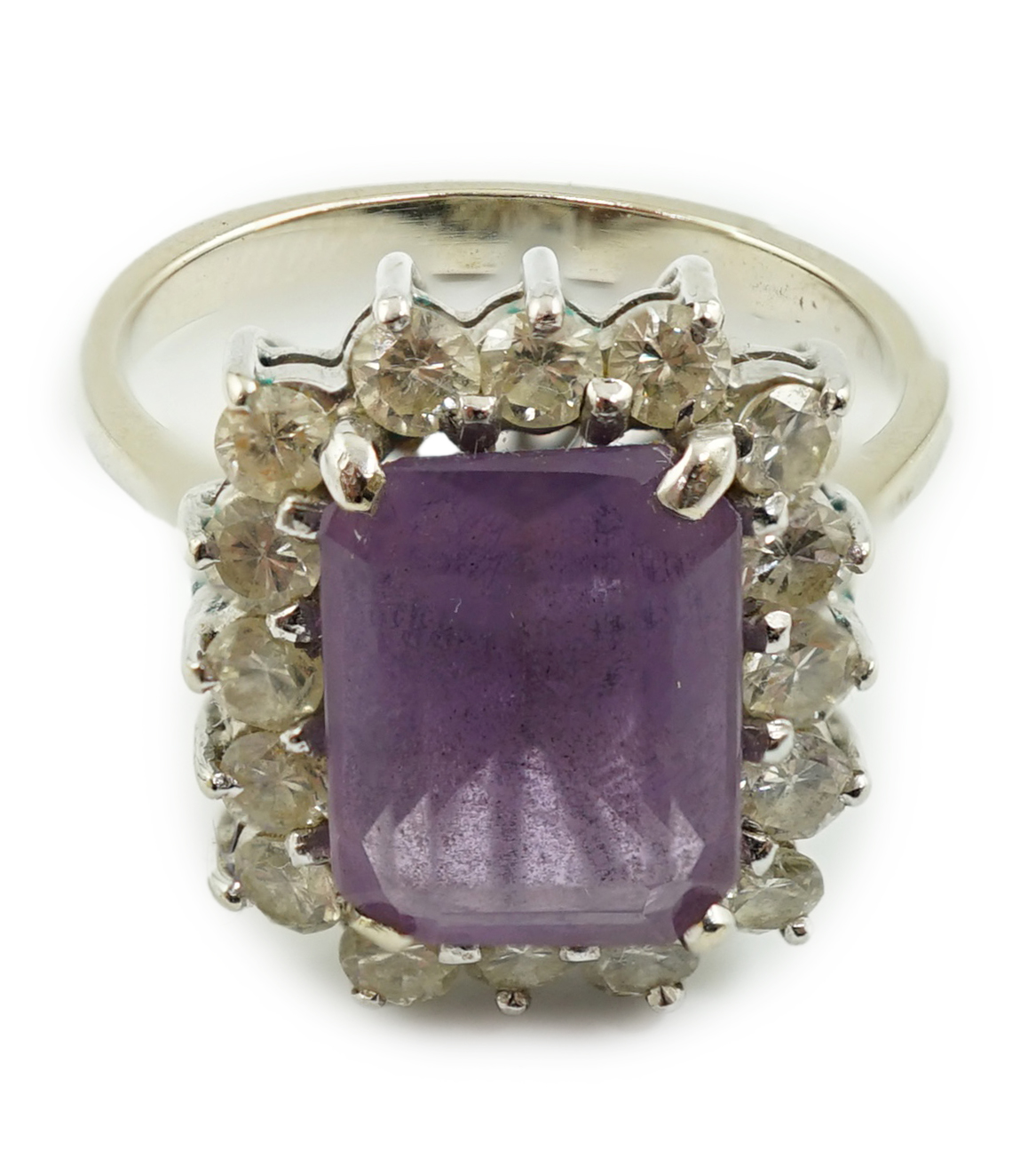 A modern white gold, amethyst and diamond set rectangular cluster ring